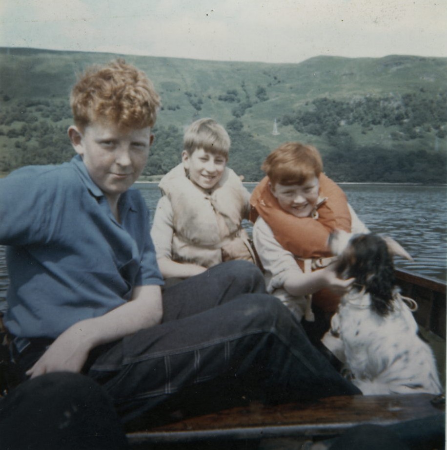Hamish Coutts, John MacDonald and Donald Coutts in a boat